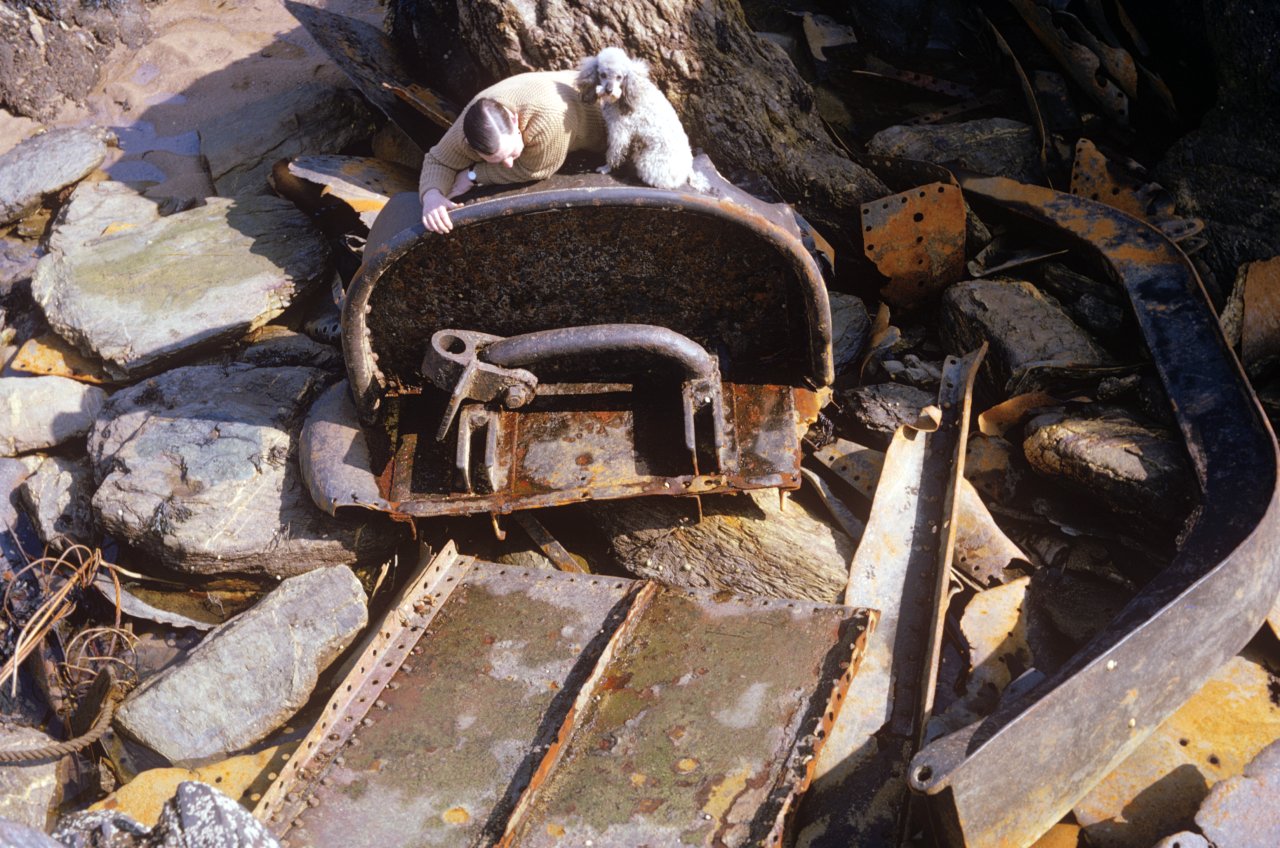 079 A-s Dad and dog look at old wreckage July 66-s